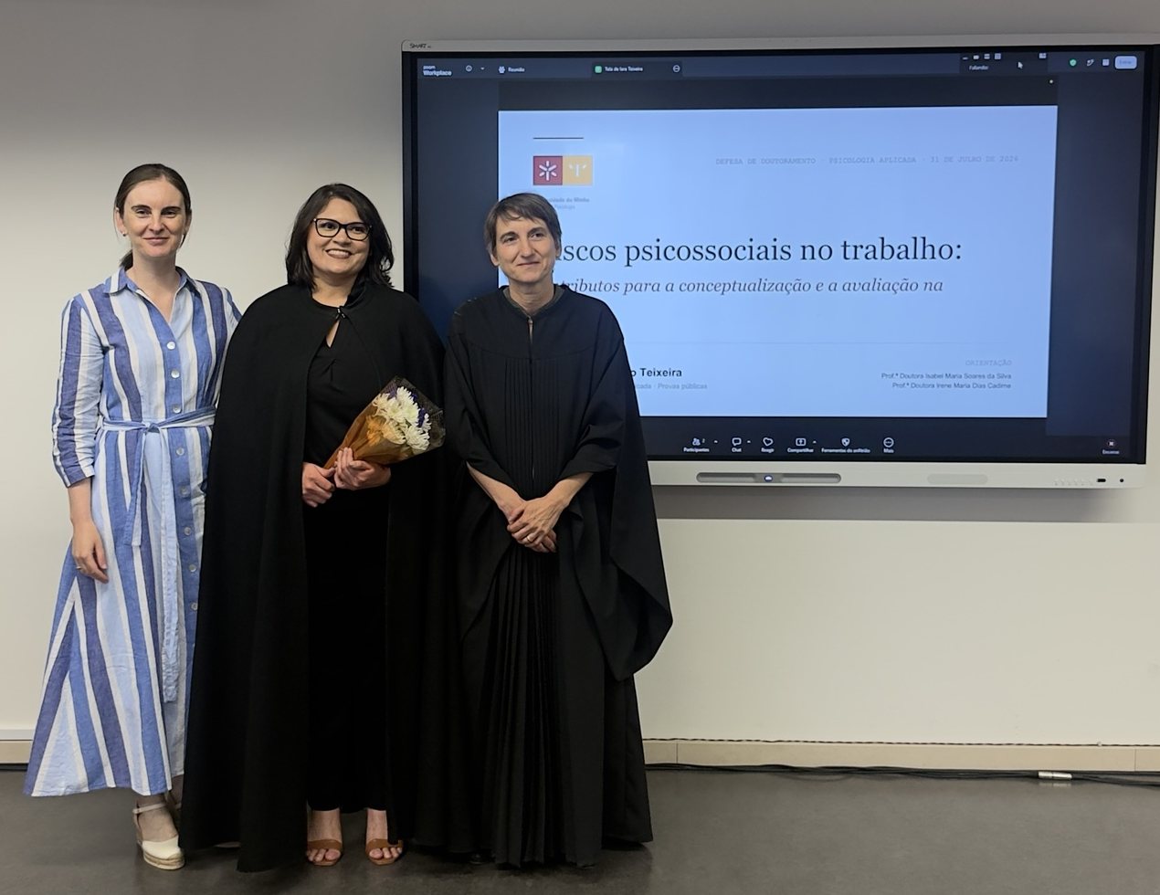 After the defense, in front of the opening slide